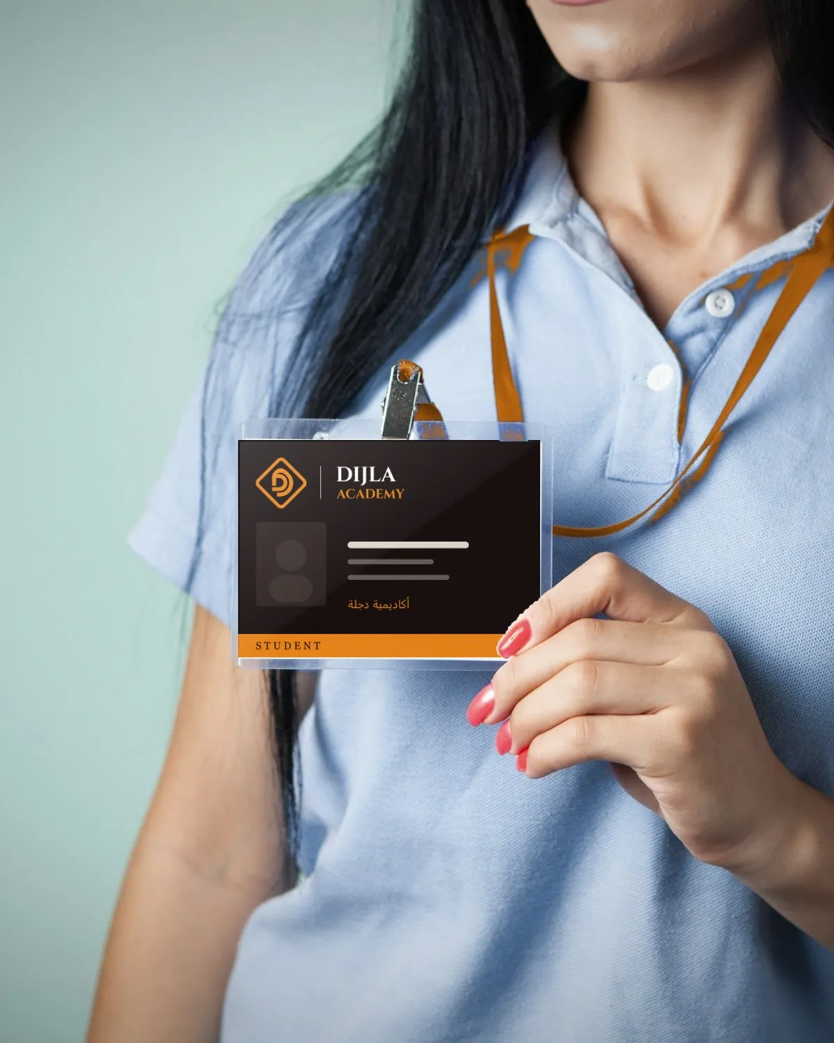 Dijla Academy student card in a lanyard holder