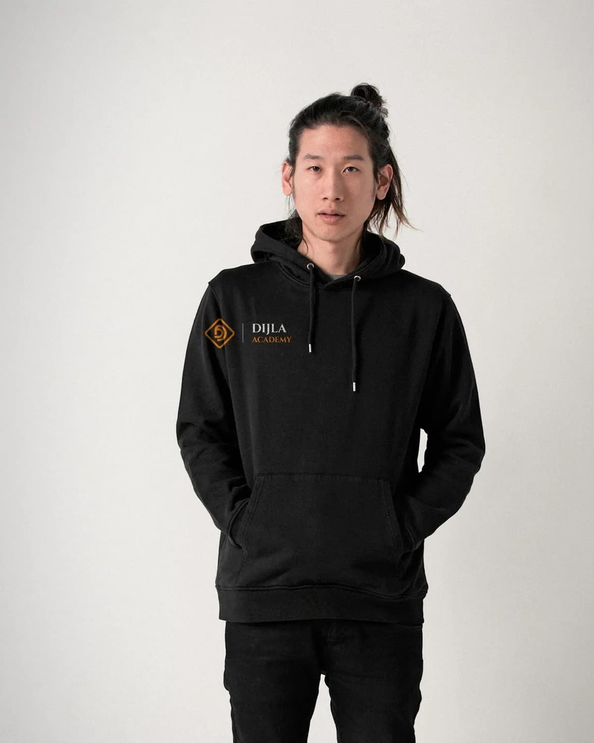 Dijla Academy logo printed on a black hoodie