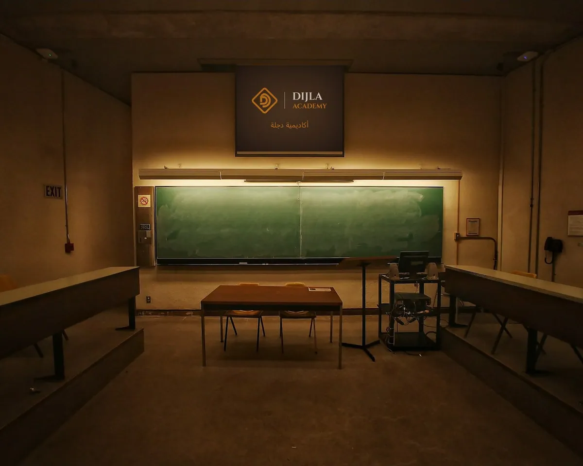 Dijla Academy title slide projected in a lecture hall