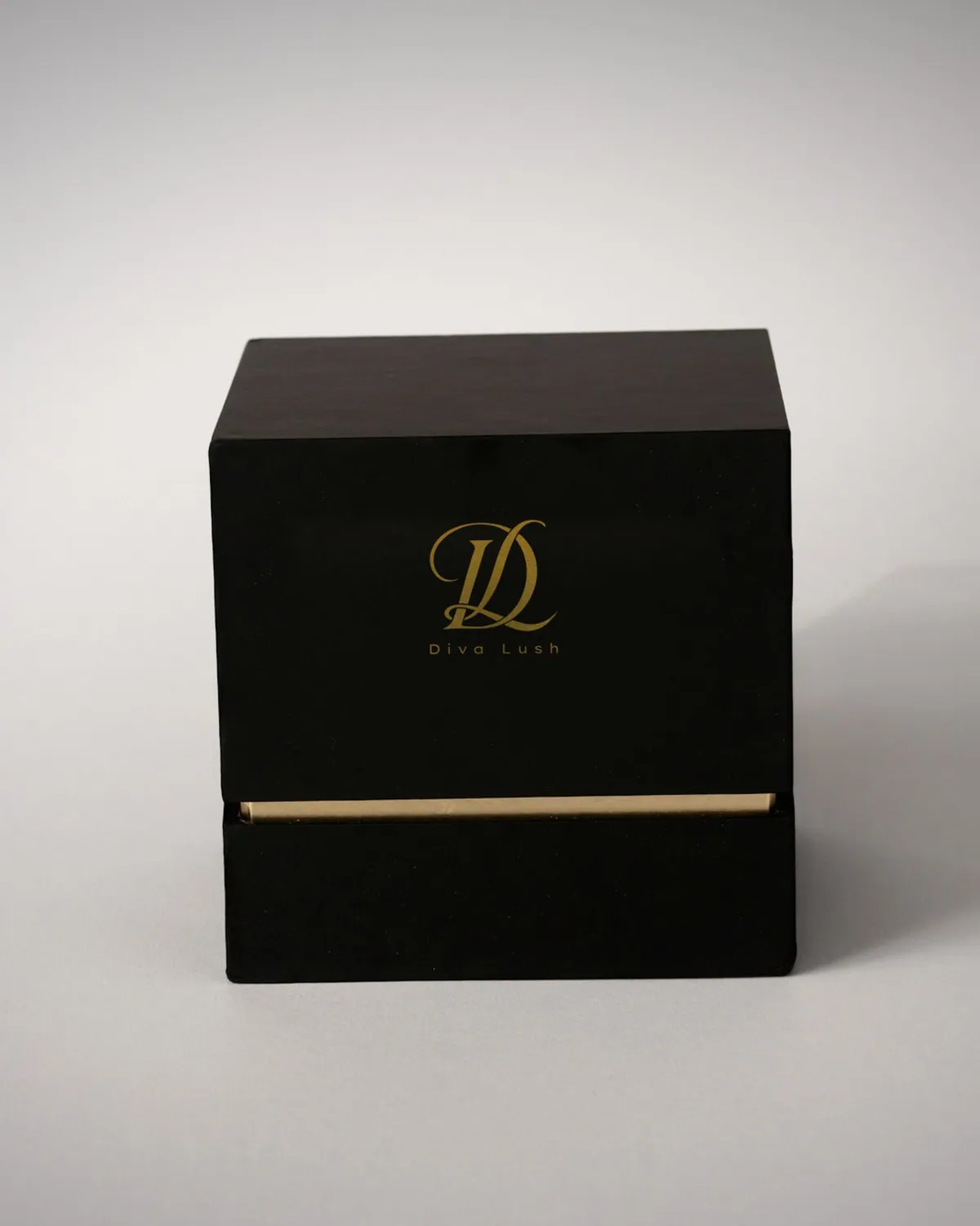 Black Diva Lush gift box with the monogram in gold foil