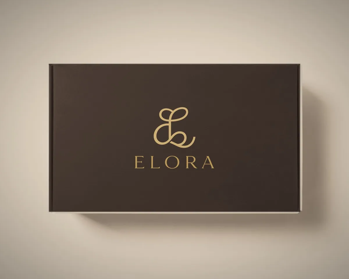 Mocha Elora box with the logo in gold foil