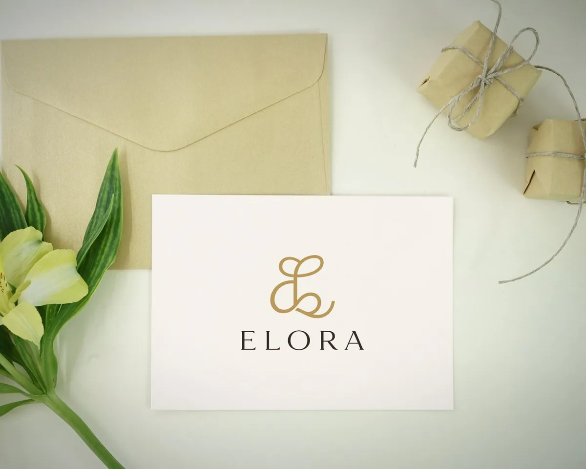 Ivory Elora card with an envelope and flowers