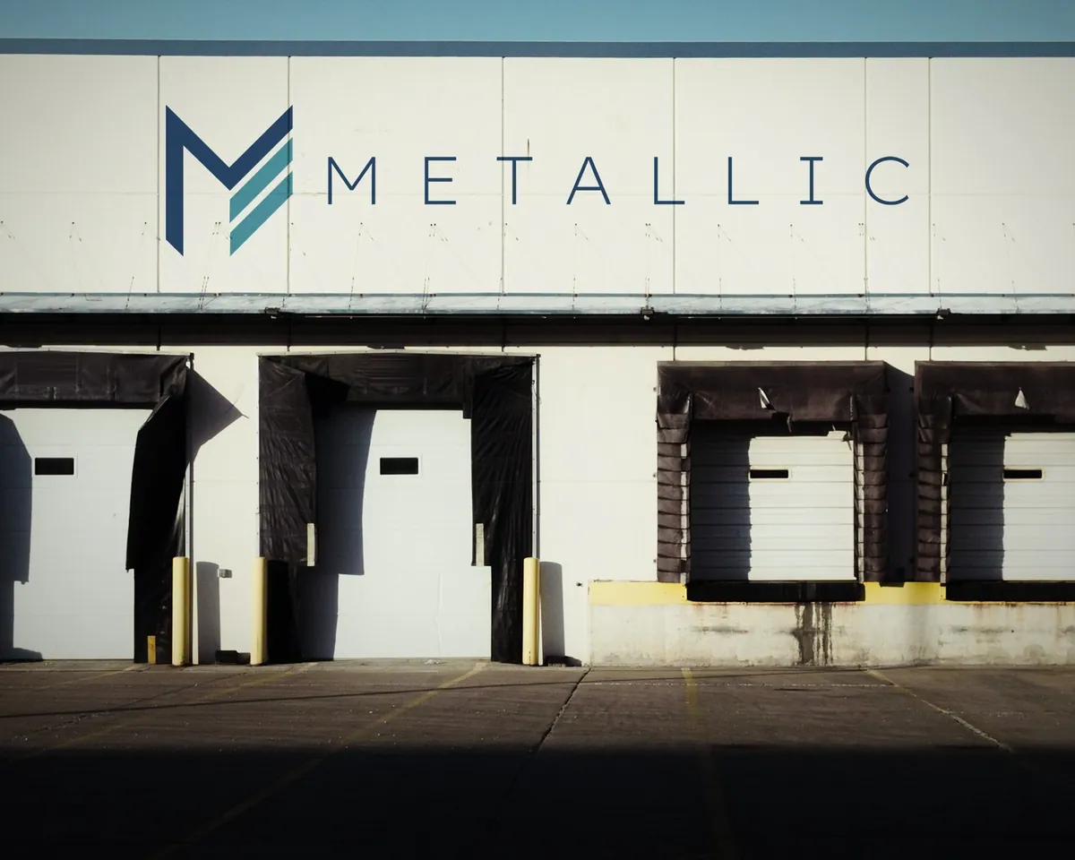 Metallic sign along a loading-dock wall