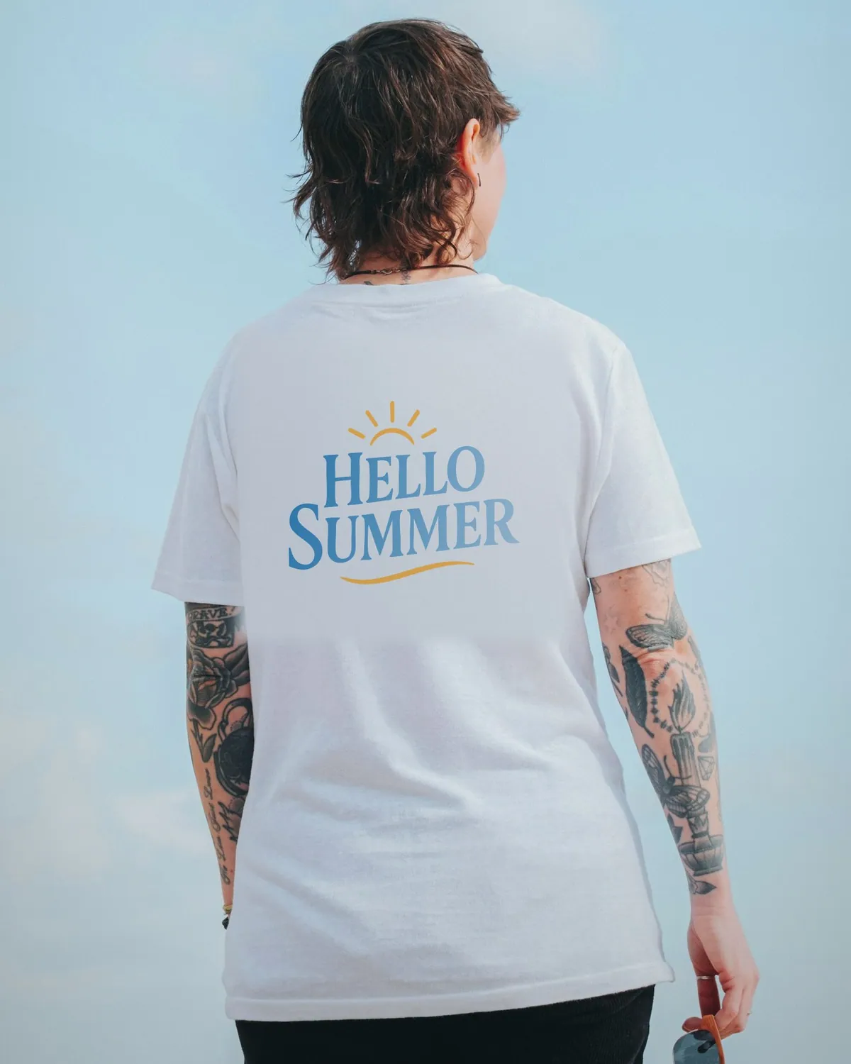 Hello Summer printed on the back of a white T-shirt
